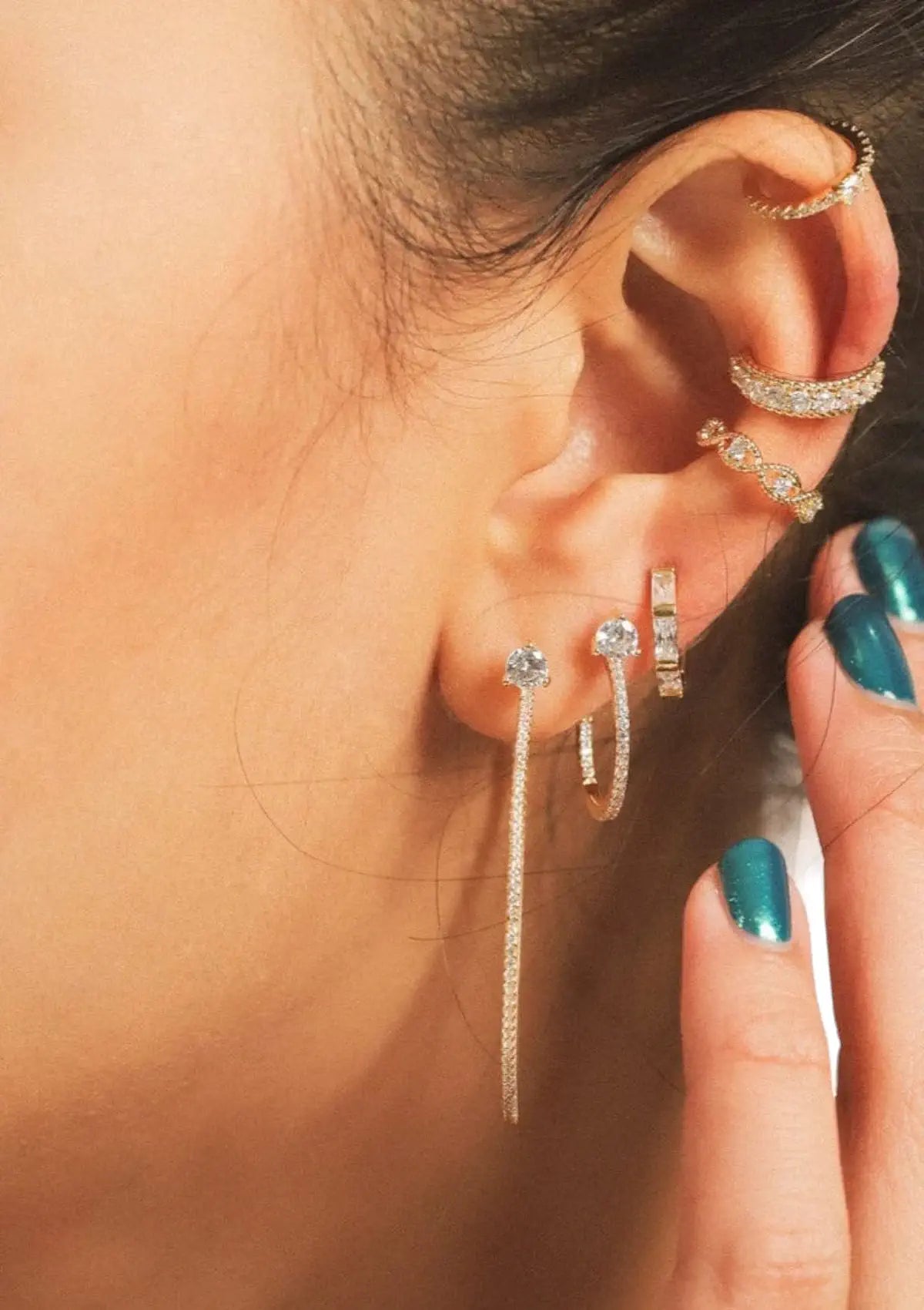 Paired with other gold earrings. Valleygirl - Tai Rittichai.