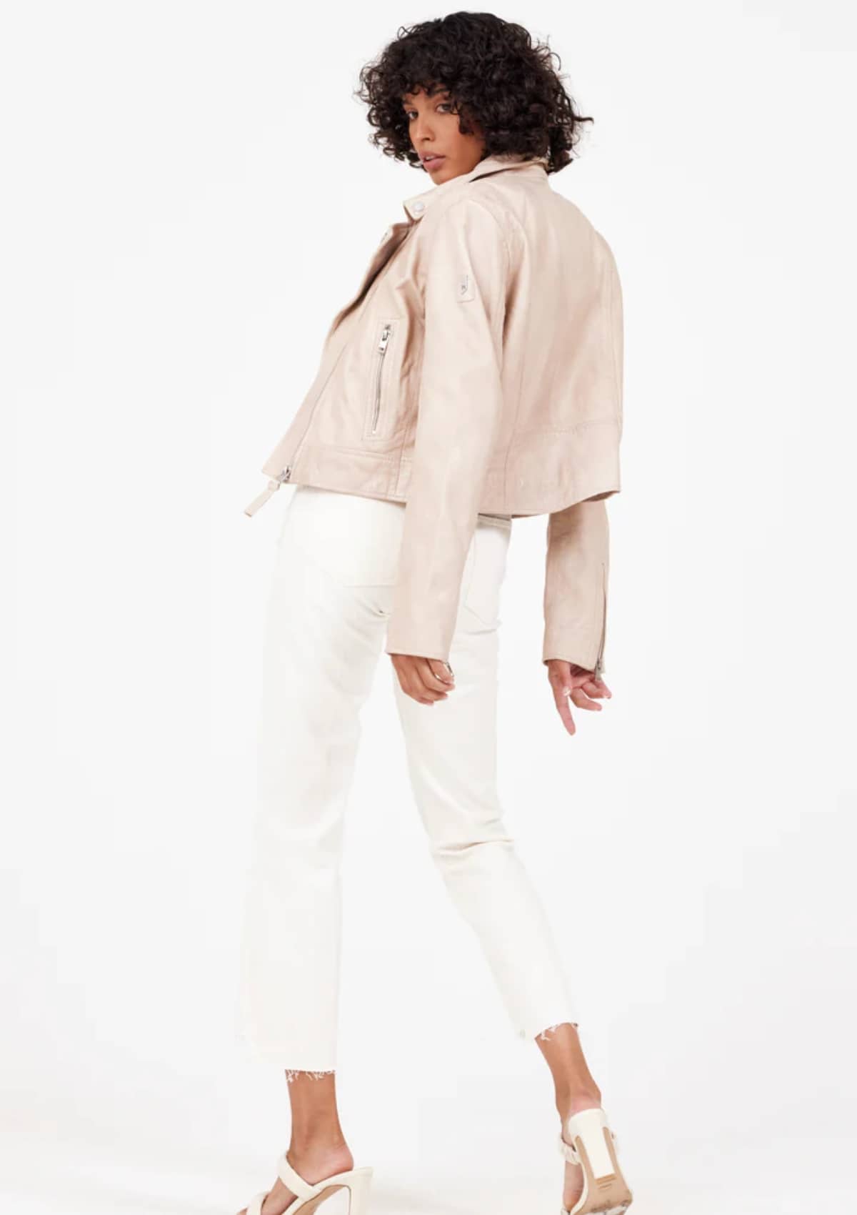 Paired with white jeans and white high heels.