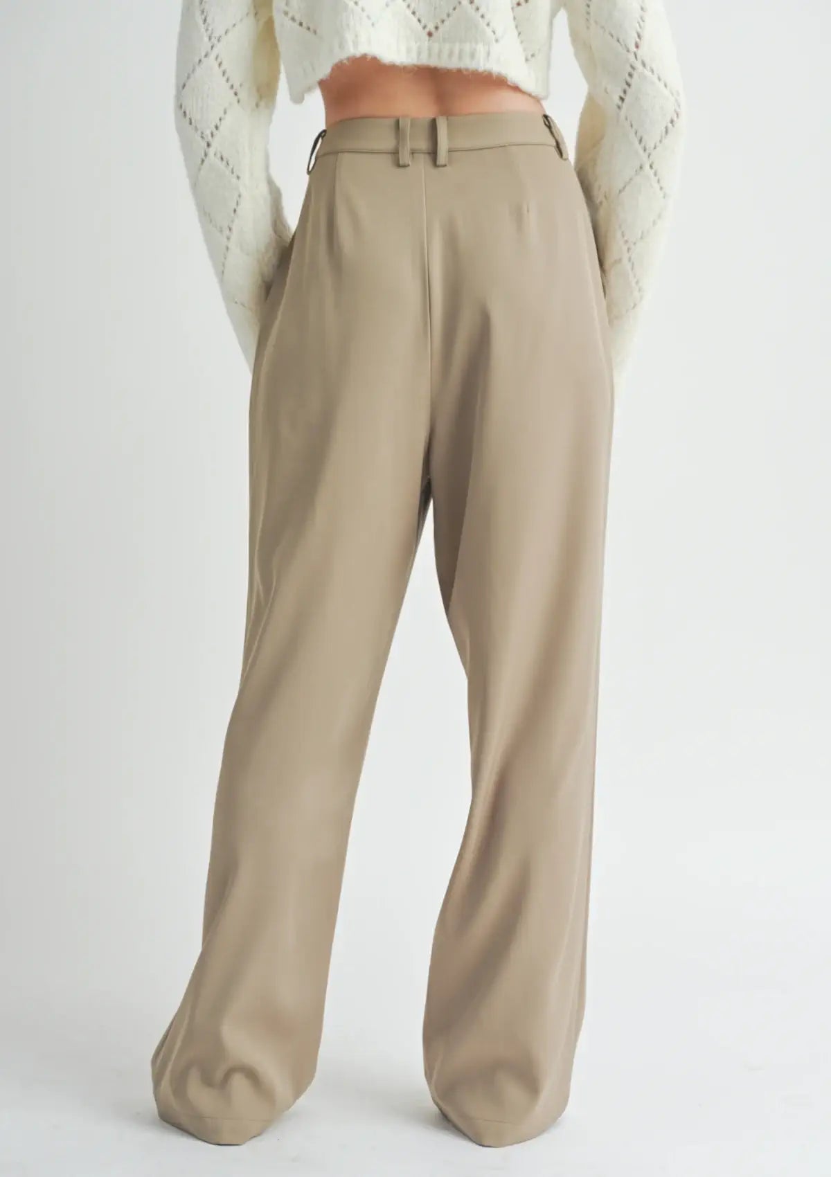 Belt loops, no pockets. Paired with white crop sweater shirt.