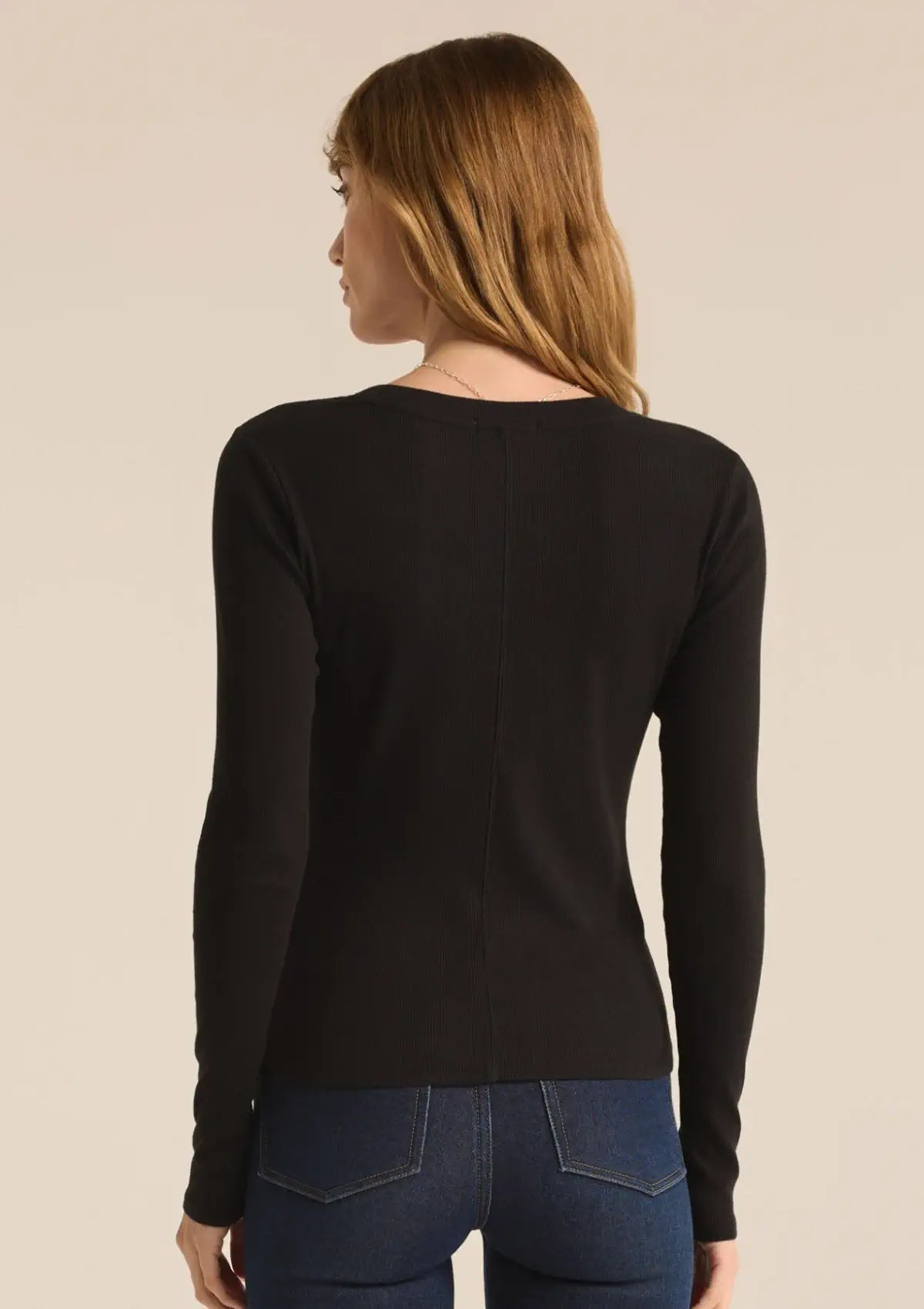 Paired with blue jeans and gold necklace.