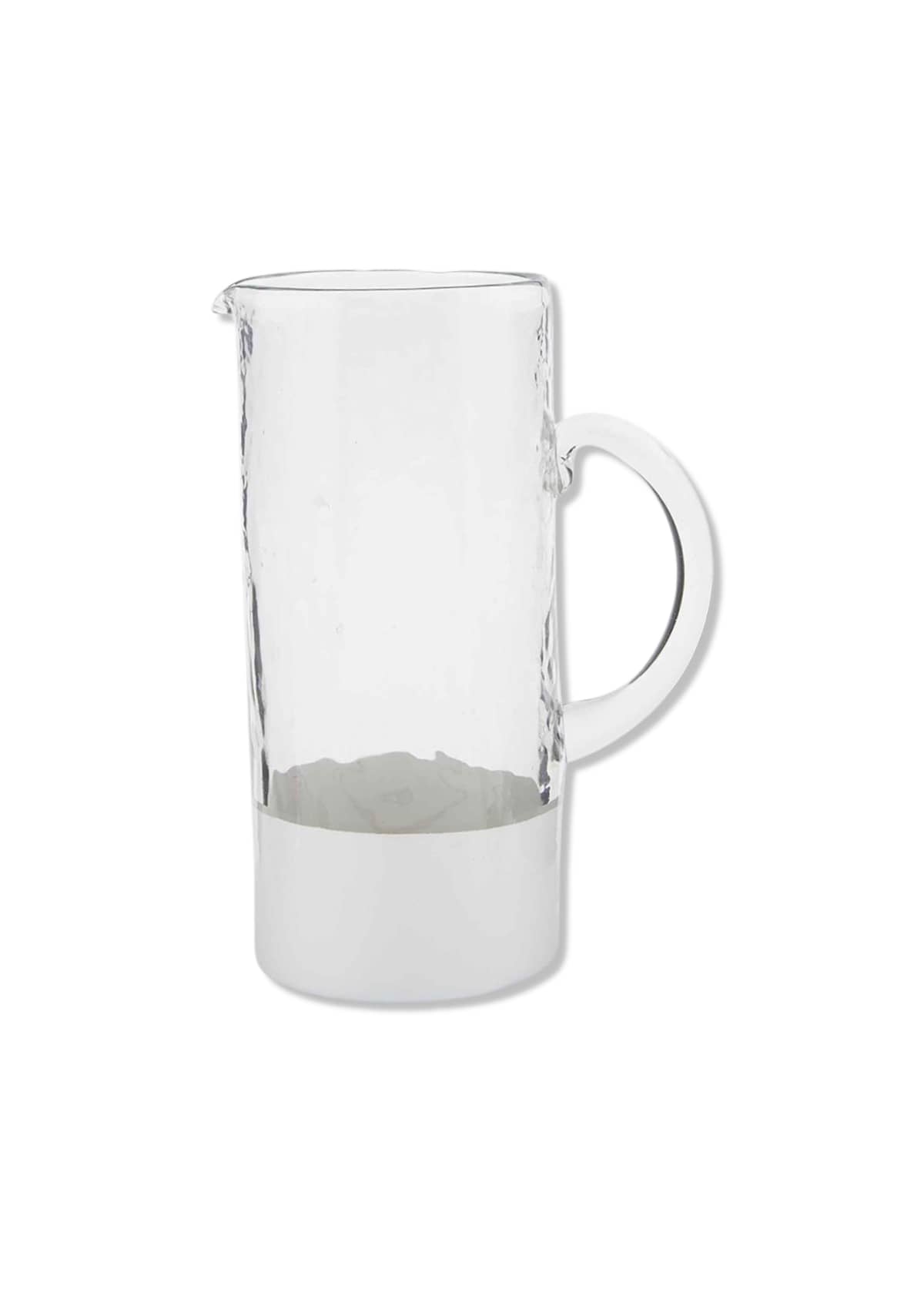 Glass with white solid on bottom. Handle.