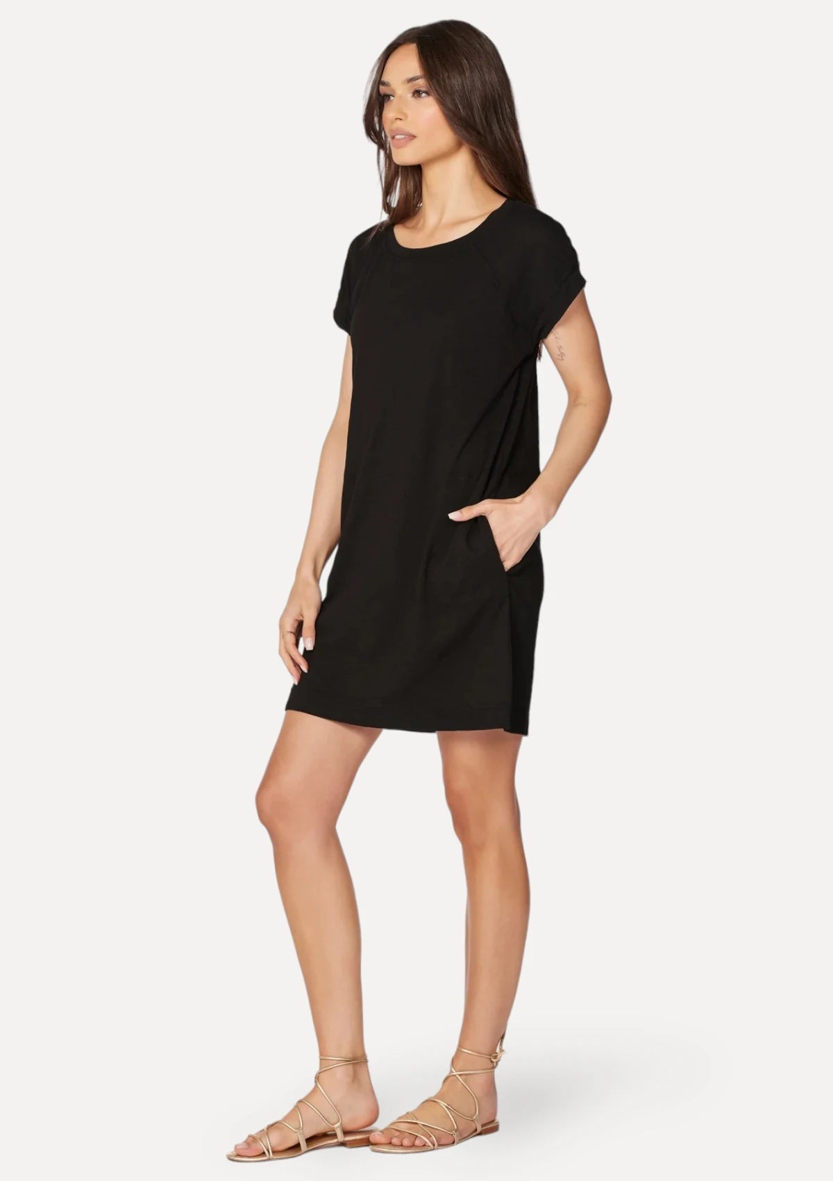 Crew neck short sleeve back mini dress with pockets.