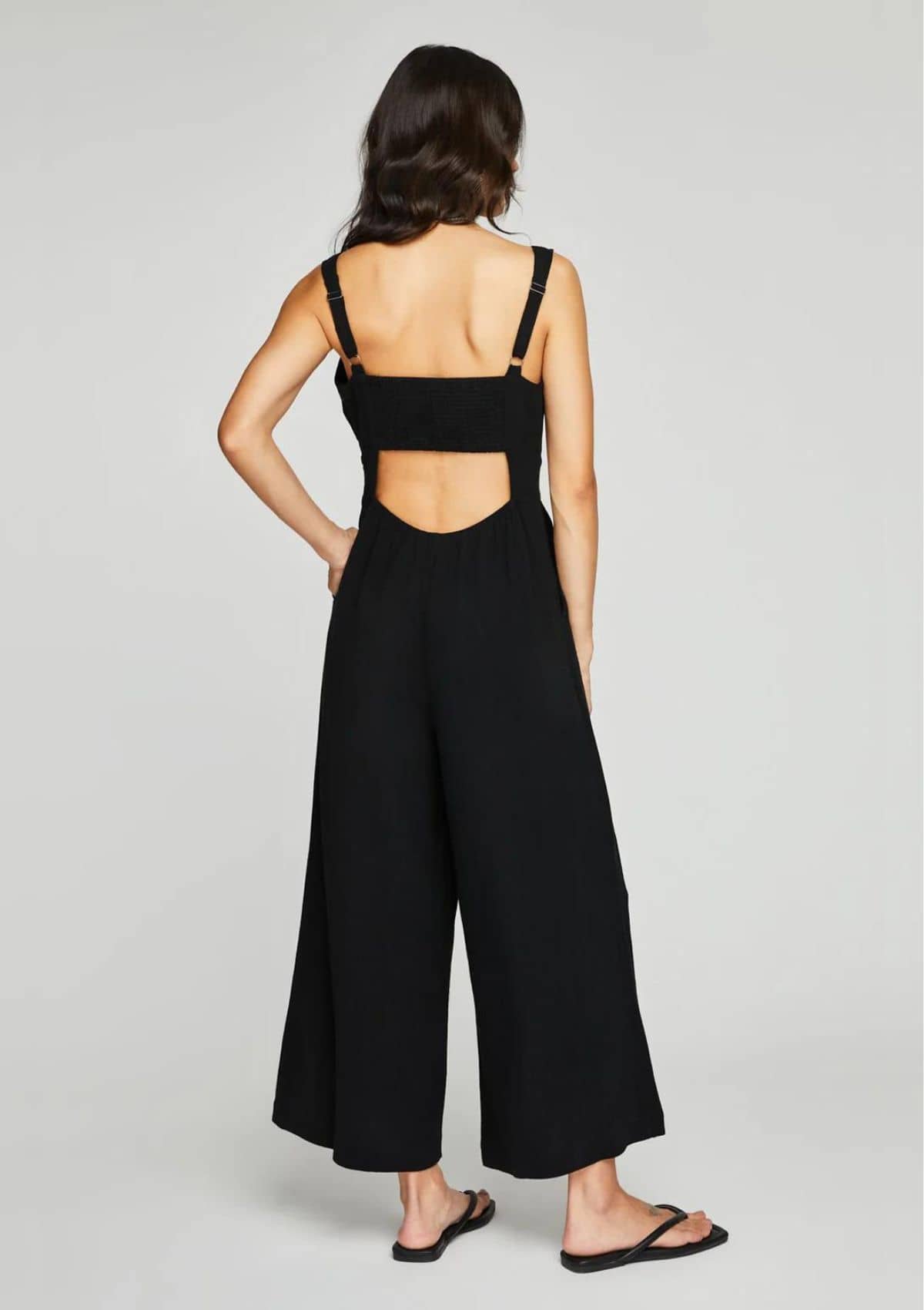 Open back, cropped length, adjustable straps.