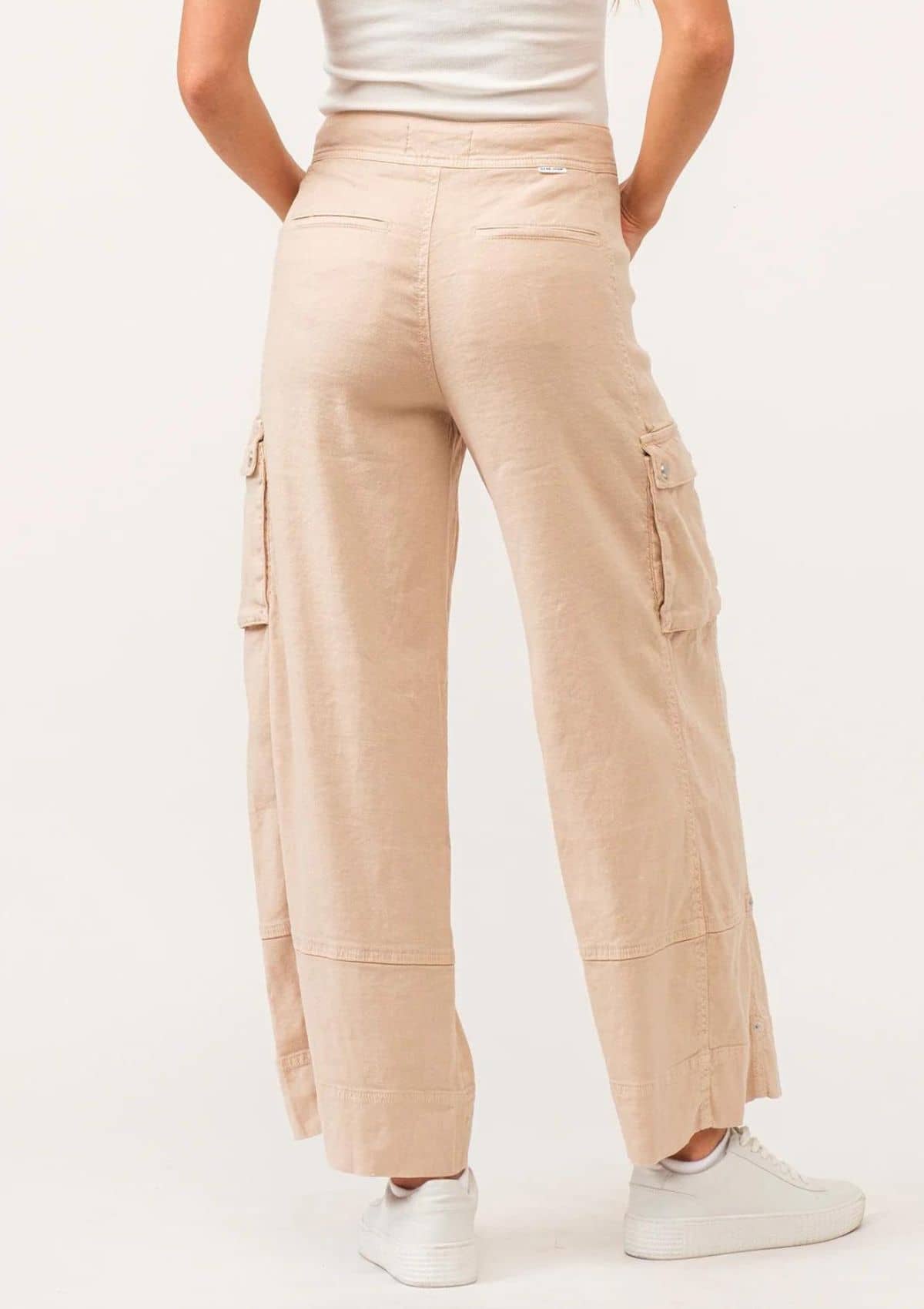 Tan with back welt pockets. Paired with white sneakers and top.