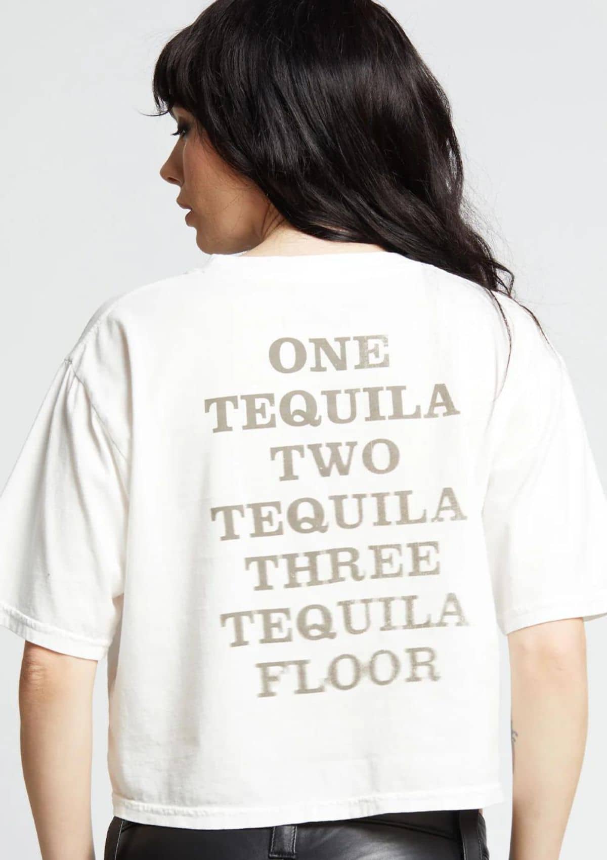 White with grey graphics about drinking tequila.