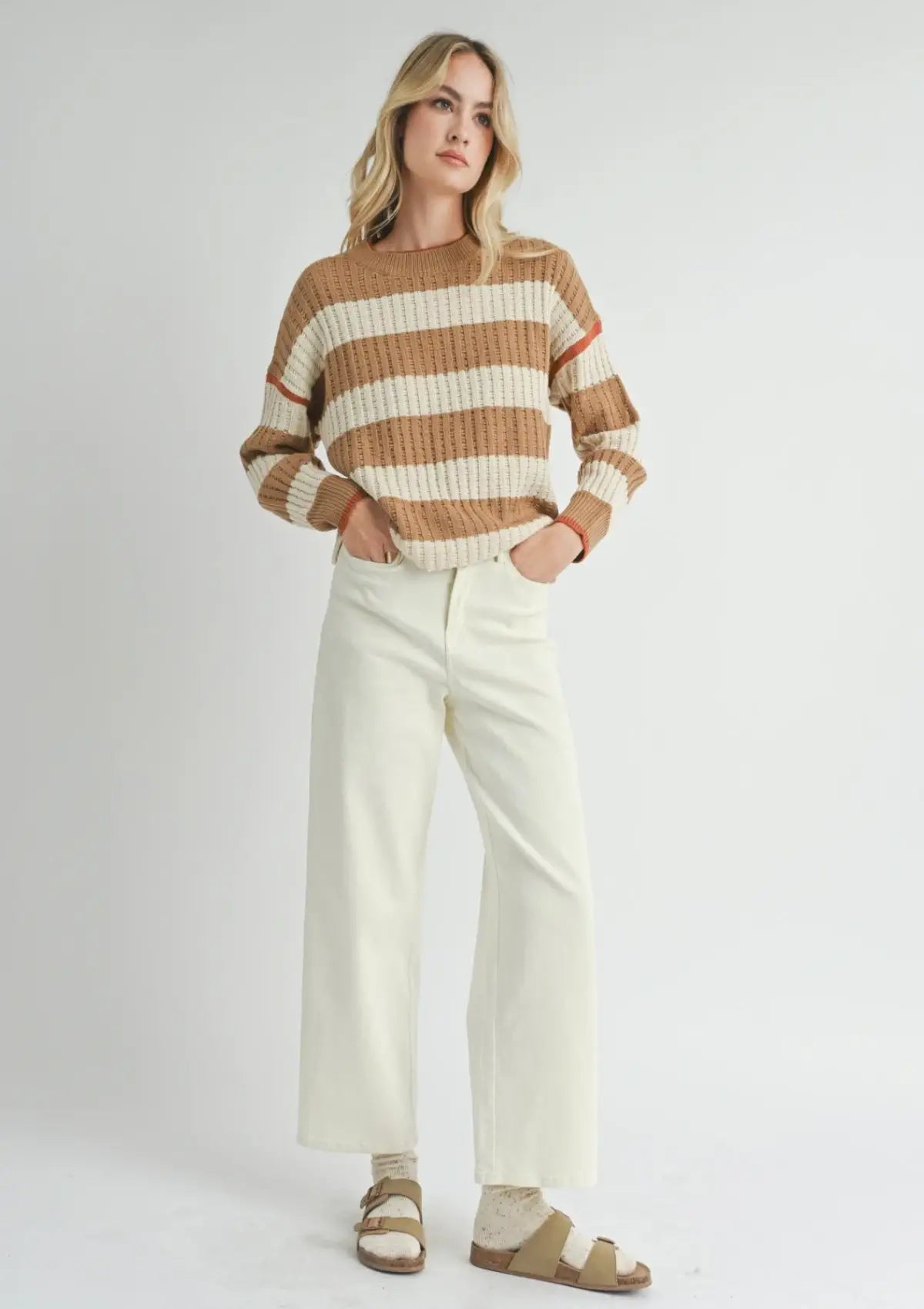 Paired with white jeans, brown sandals with socks. Clothes from Sadie & Sage.